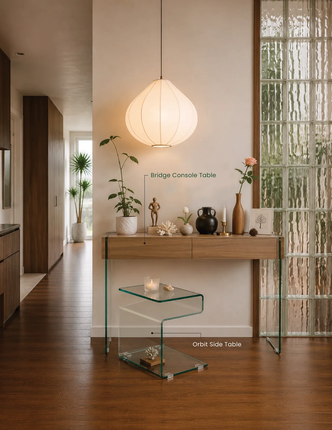 Levita glass console and side table in a sunlit hallway