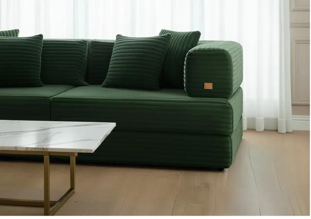 Nest sofa in deep green ribbed fabric